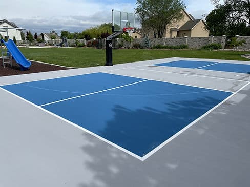 Salt Lake County pickleball court with blue and gray premium surfacing