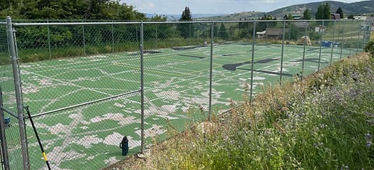 Premium acrylic pickleball court installation in progress
